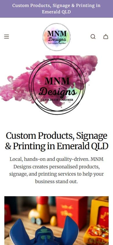 Homepage of MNM Designs, mnmdesigns.com.au on a phone, captured September 2026
